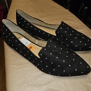 Report black faux suede flats with silver studs.